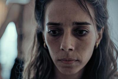 Gabriela looks on