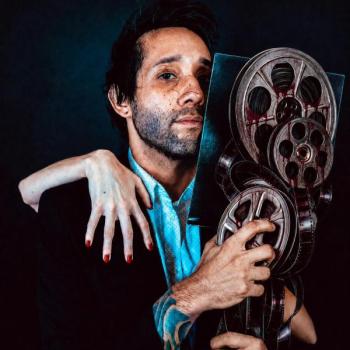 Director Samuel Gonzalez Jr. in a cinematic portrait representing his horror film THE REVIEW.